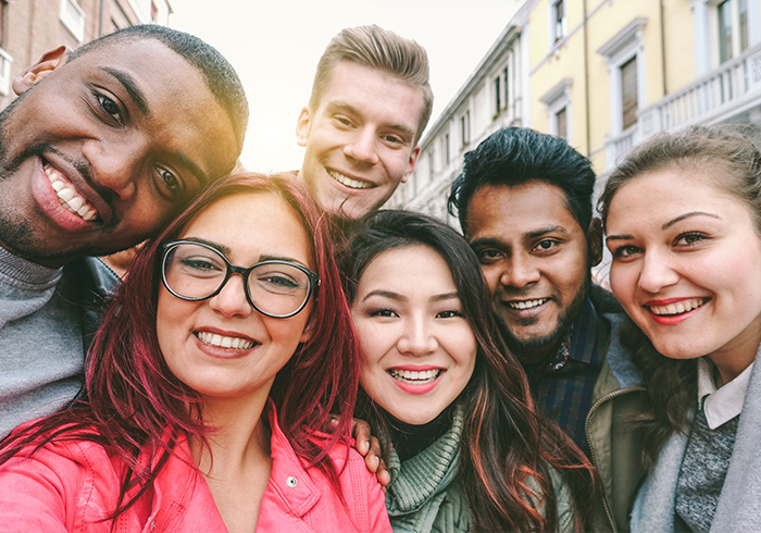 A group of international students taking a selfie